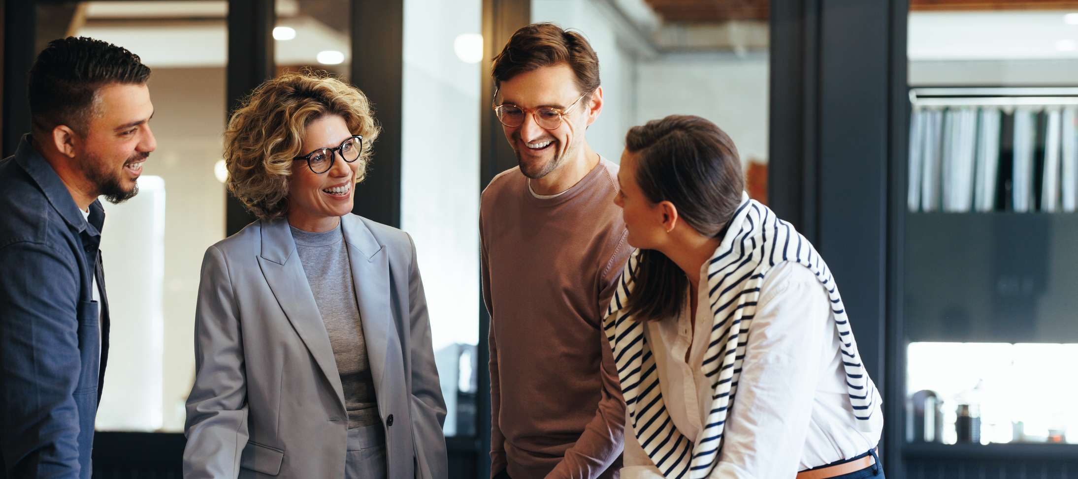 Allianz Pension Partners, Betriebsräte und Betriebsrätinnen: Vier Menschen in einem Besprächungsraum.